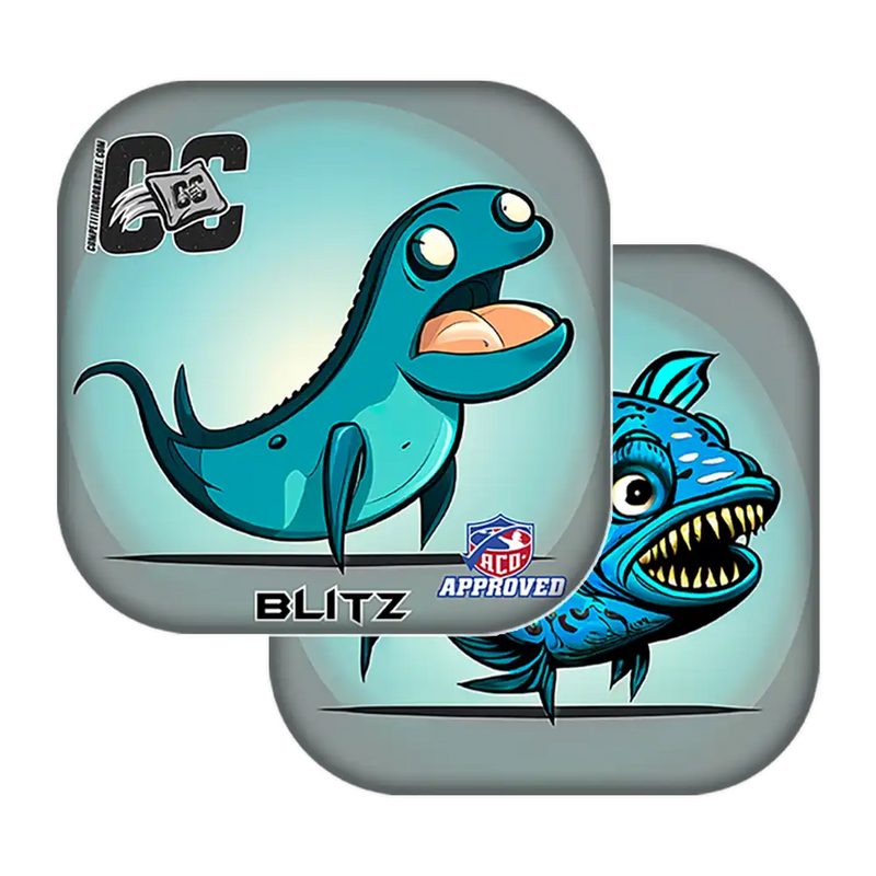 Two blue fish-shaped Cornhole bags with cartoon designs on a white background