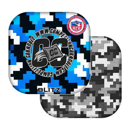 Two camouflage-patterned cornhole bags with visible branding on a white background