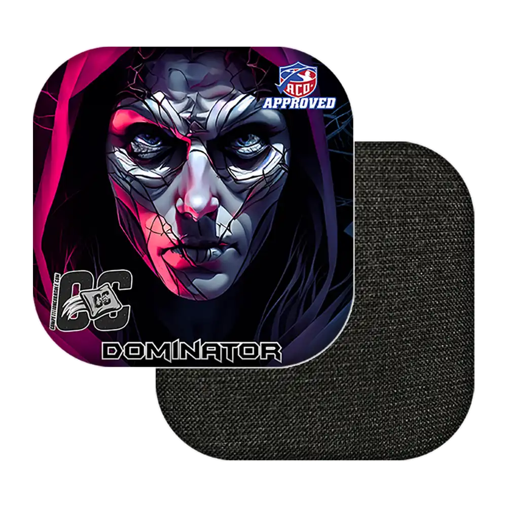 Cornhole bags with a stylized face design and 'Dominator' branding on a white background