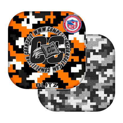Two camouflage-patterned cornhole bags with visible branding on a white background