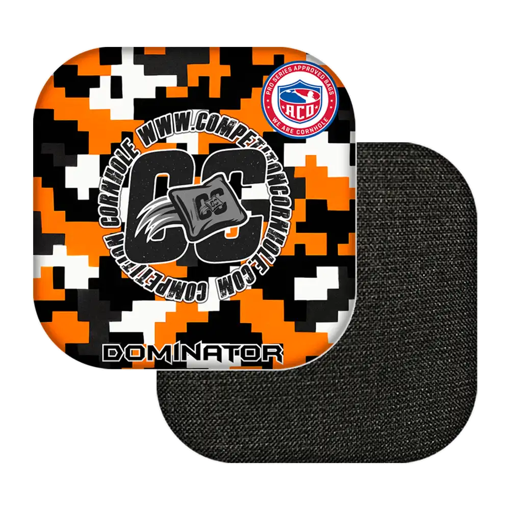 Black, orange, and white camouflage-patterned product with 'Dominator' branding on a white background.