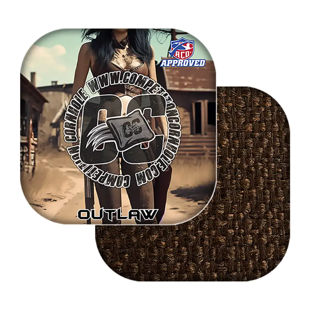 Cornhole bags with 'Outlaw' branding and textured brown surface