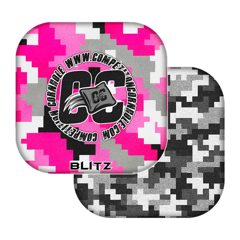 Two camouflage-patterned cornhole bags with a visible brand logo on a white background