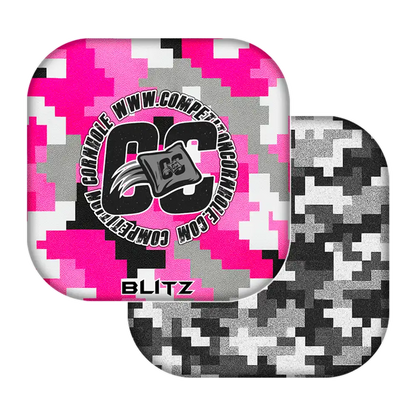 Two camouflage-patterned cornhole bags with a visible brand logo on a white background