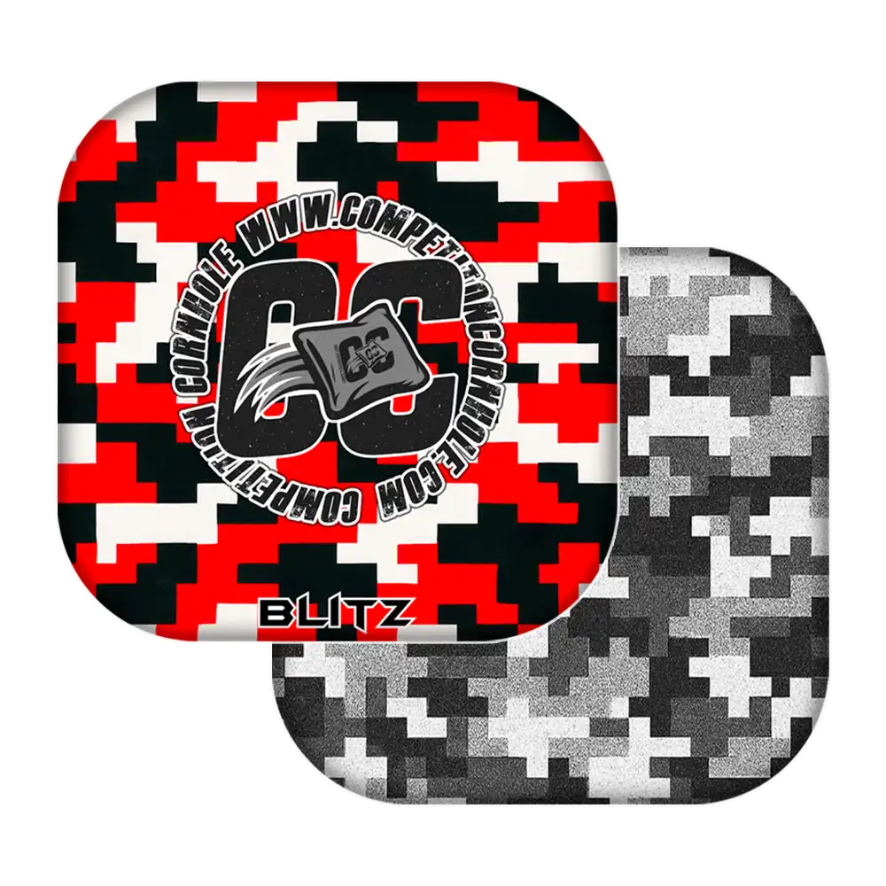 Two geometric-patterned cornhole bags with a central logo on a white background