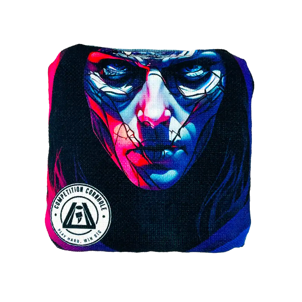 Colorful face design on a black background with a visible brand logo.
