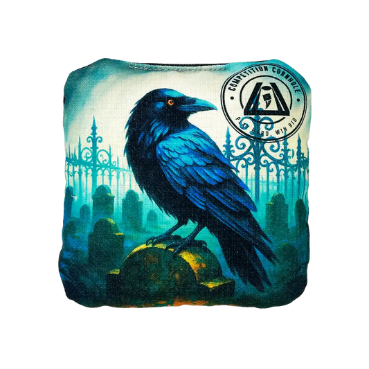 cornhole bag with a blue raven design on a white background