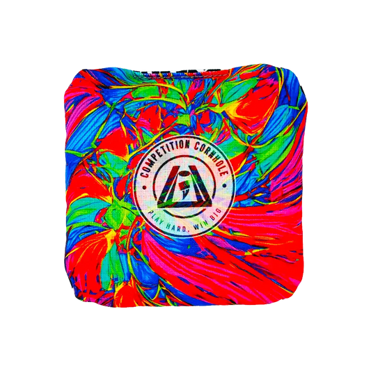 Colorful tie-dye cornhole bag with a logo on a white background