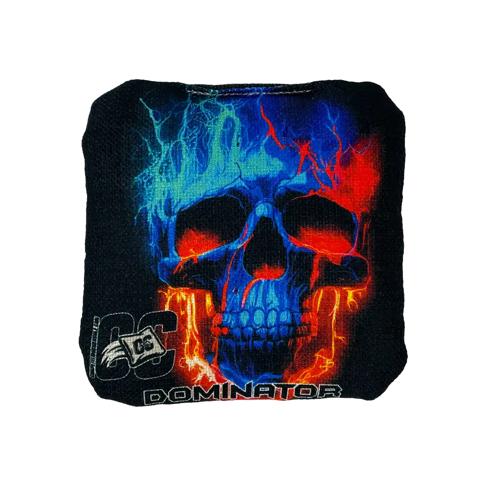 Cornhole bags with colorful skull design and 'Dominator' branding on a white background